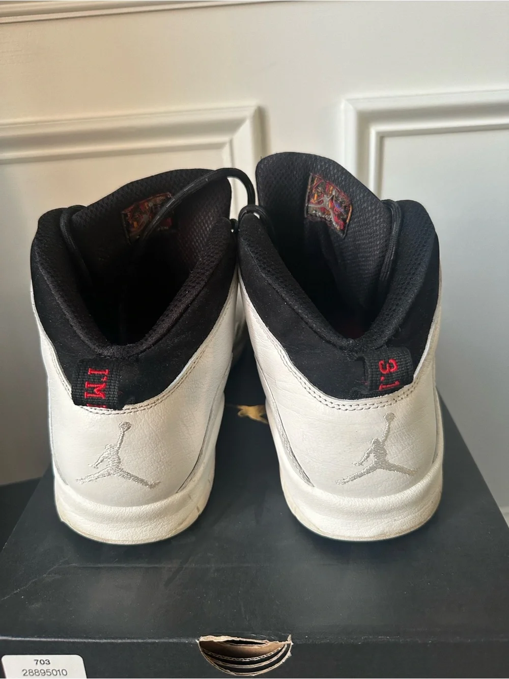 Jordan Black and White High-Top Sneakers with Red Liner